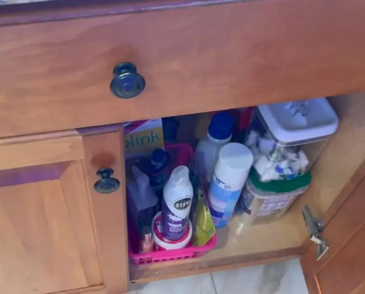 how to get rid of chemical smell under kitchen sink